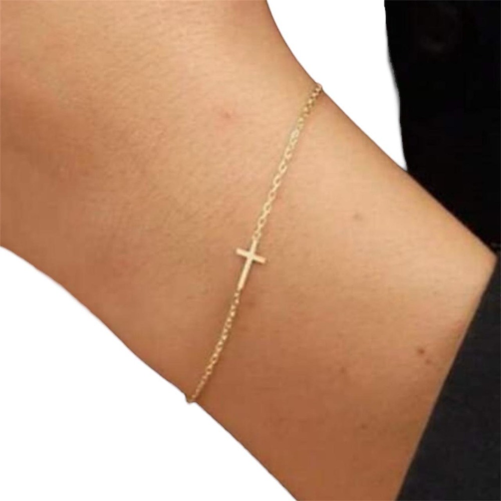 Pretty gold-toned cross bracelet - clasp closure with extension chain